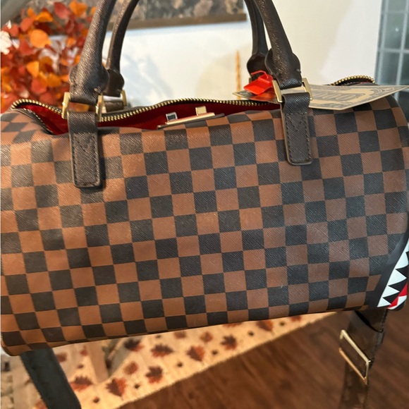 Sprayground mini duffle (checkered and camo)